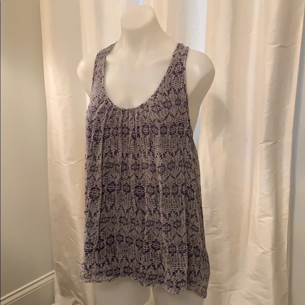 Super cute boho chic tank with ruffled racer back